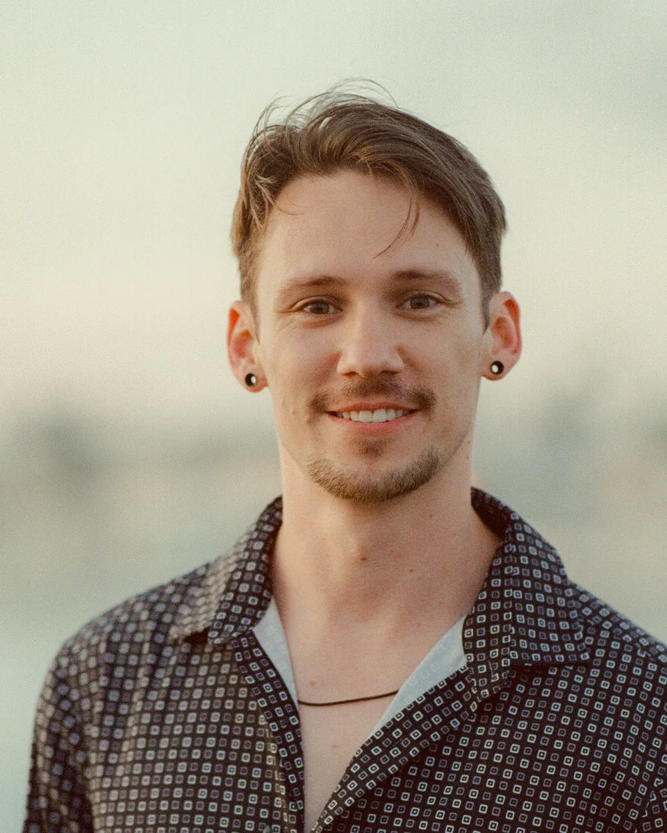 Cory McCabe standing outdoors in Encinitas, California.